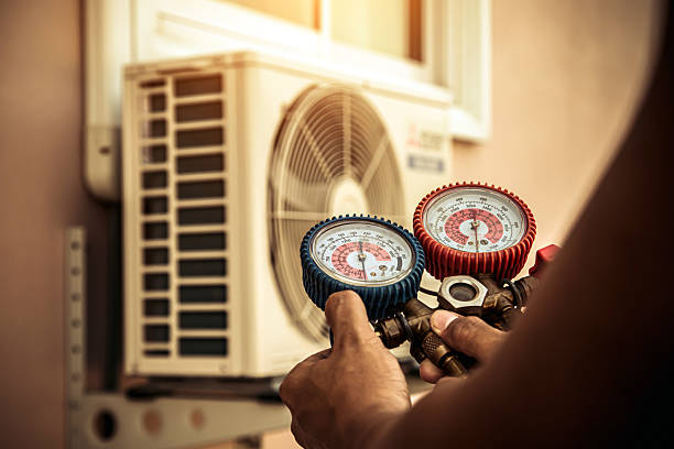 Professional Hvac technician working in Mission Hills, KS